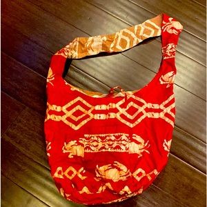 Red and tan beach/ shopping bag. Large loose hanging. Satchel style.